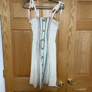 Off-white, flowy, sleeveless dress